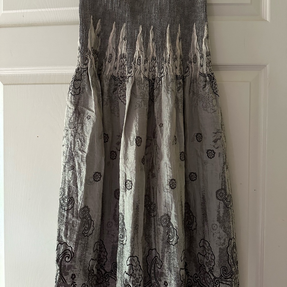 Multi purpose item: halter dress; skirt.
